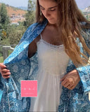 KIMONO CORTO CON BOLSILLOS AZULINO